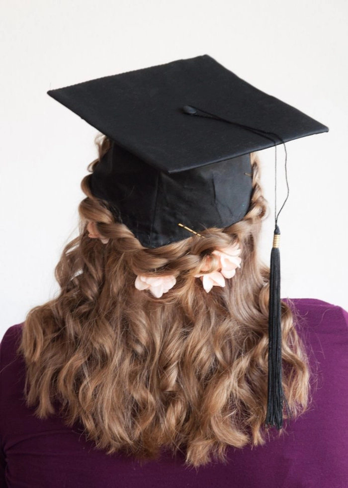 Graduation cap hair framing technique with sleek side-swept waves
