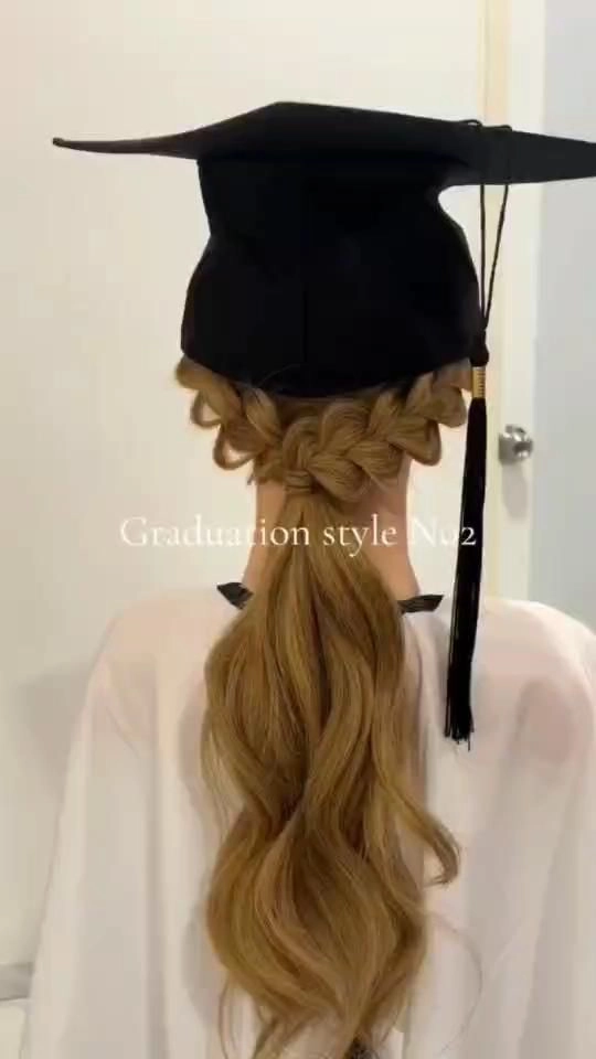 Graduation cap positioned over hair styled with framing techniques
