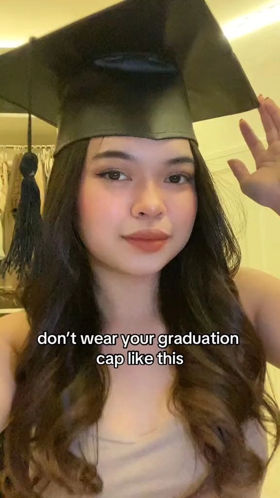 Elegant graduation cap hairstyle for fine hair with volume Fine hair graduation hairstyle styled with subtle waves under the cap