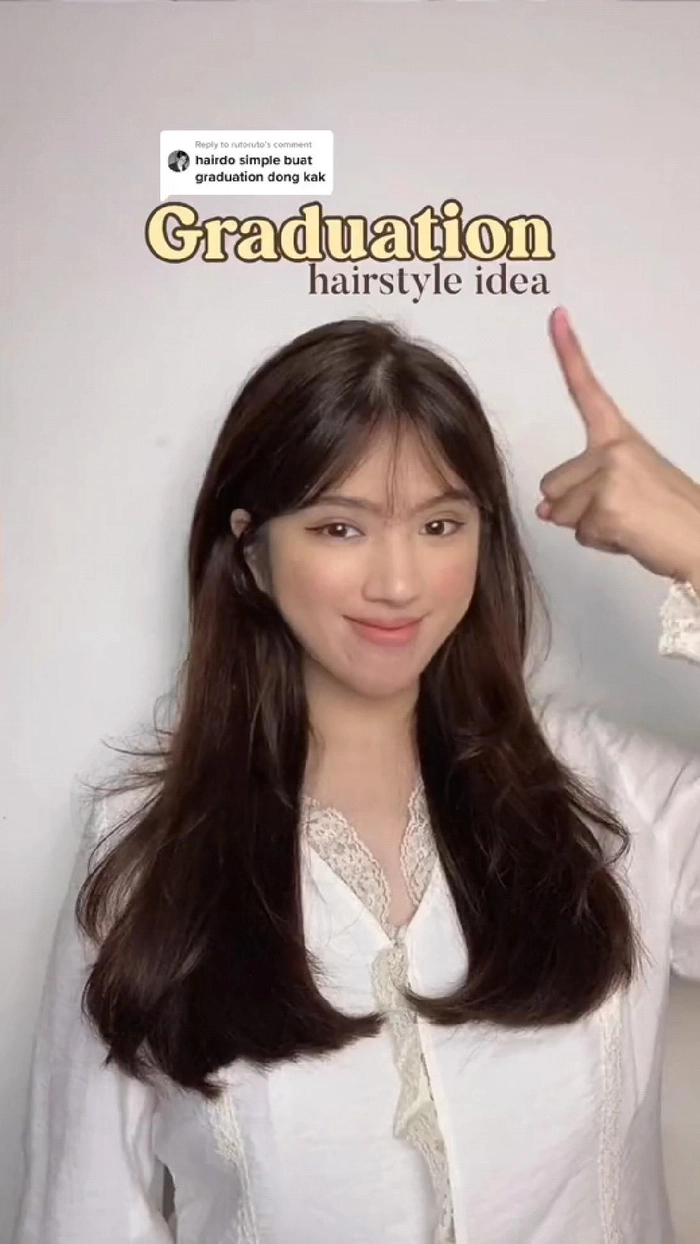 Graduation cap hairstyle for thick hair with elegant volume and side detail