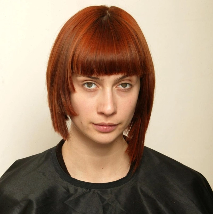 A graduation hairstyle with seamlessly blended hair extensions for a polished look