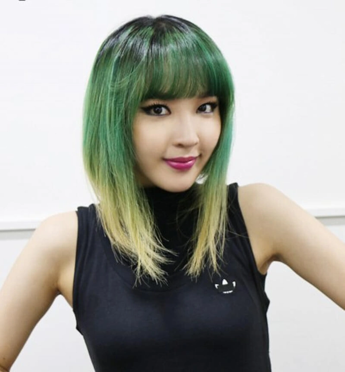 Elegant graduation hairstyle with soft curls for Asian hair texture