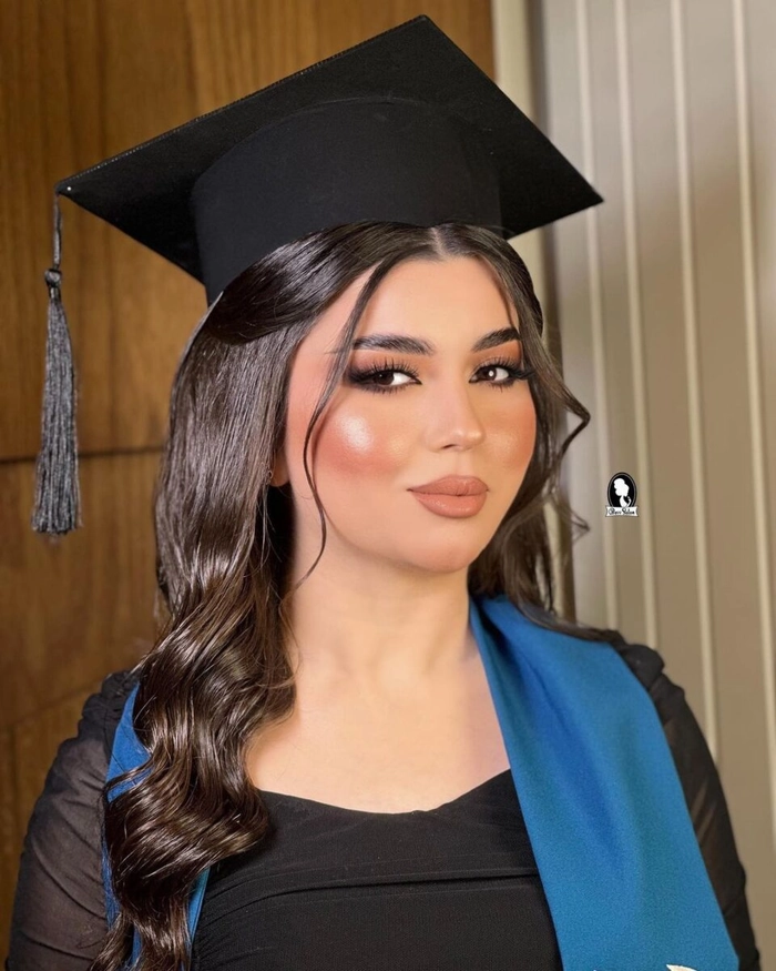 Elegant updo with double cap and gown accessories for two ceremonies