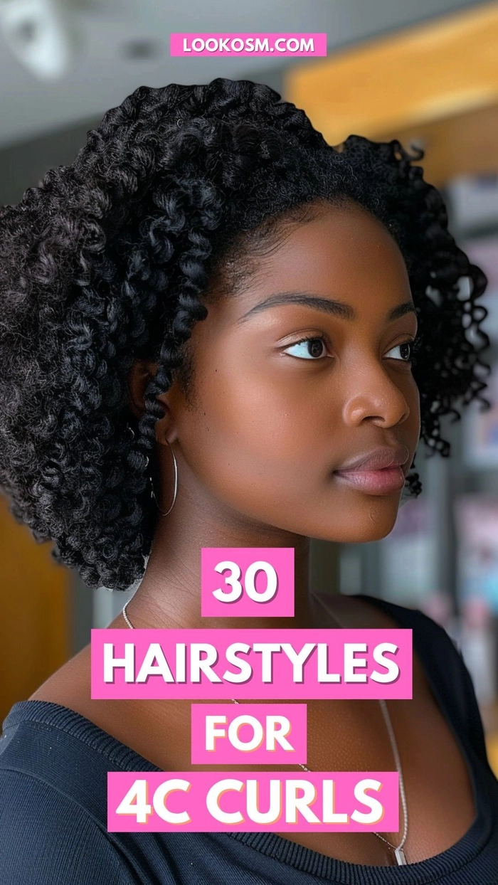 A graduation hairstyle for type 4c hair featuring defined curls and a graduation cap