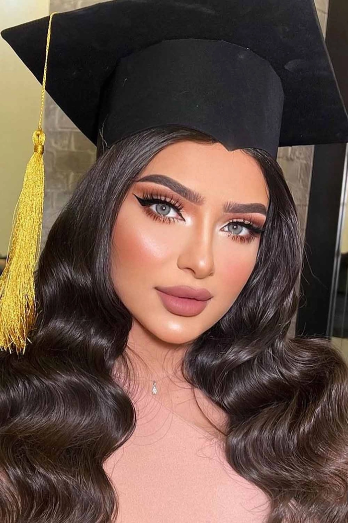 Elegant military academy graduation hairstyle featuring a polished bun and formal cap A female cadet with a neat updo graduation hairstyle at a military academy ceremony