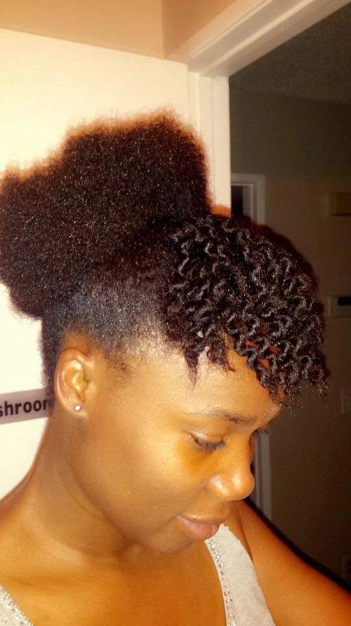 Graduation hairstyle for type 4c hair featuring a chic updo with defined curls and accessories