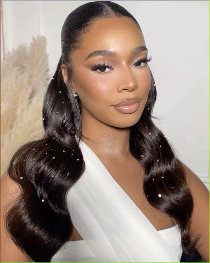Graduation hairstyle with crystal clips adding sparkle to the look