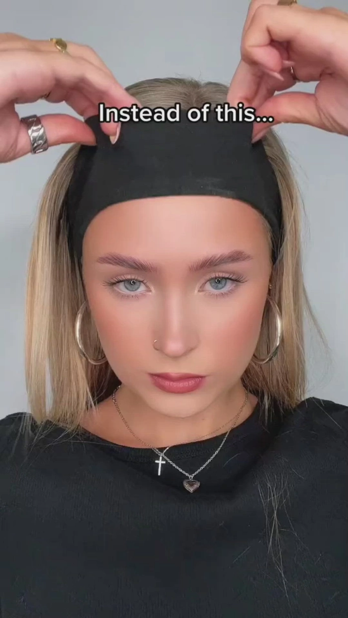 Graduation hairstyle with a delicate headband and soft curls cascading down