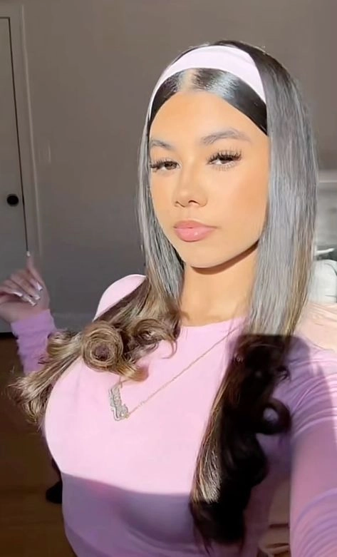 Graduation hairstyle with delicate headband for a polished look