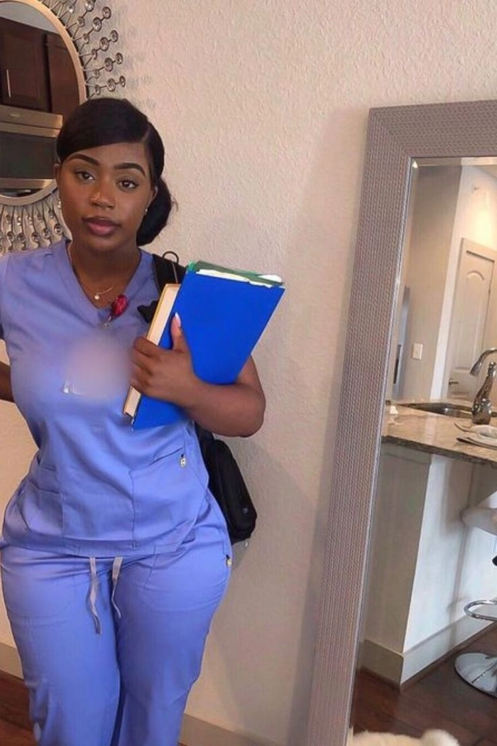 Sleek low bun hairstyle for a nursing student graduation ceremony