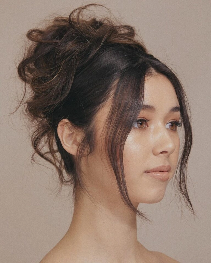 High bun placement for graduation cap with no hat alteration