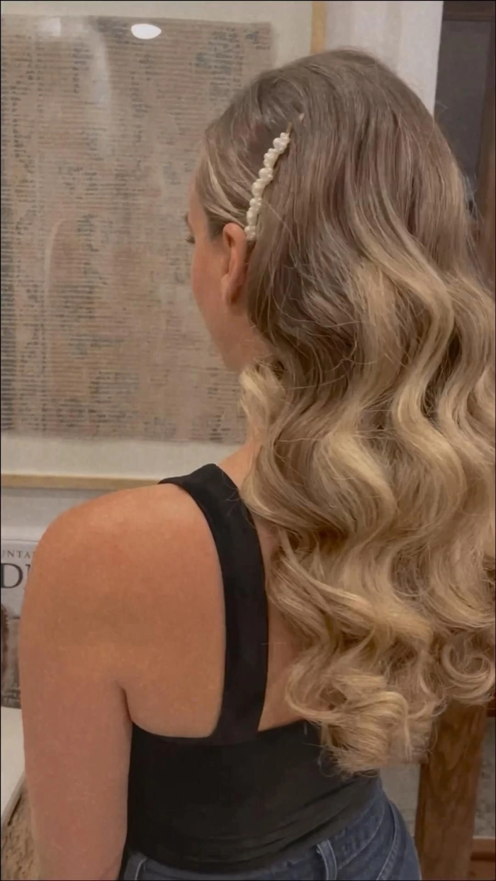 Hollywood waves graduation hairstyle for female graduate