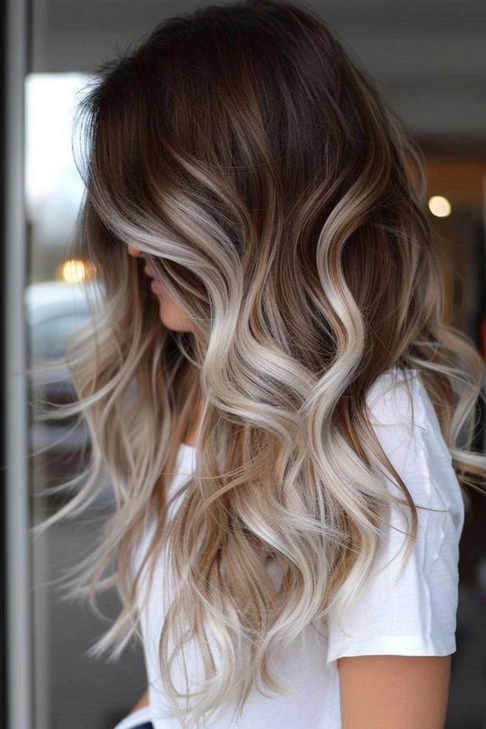 Humidity proof graduation hairstyle pinned in a chic low bun