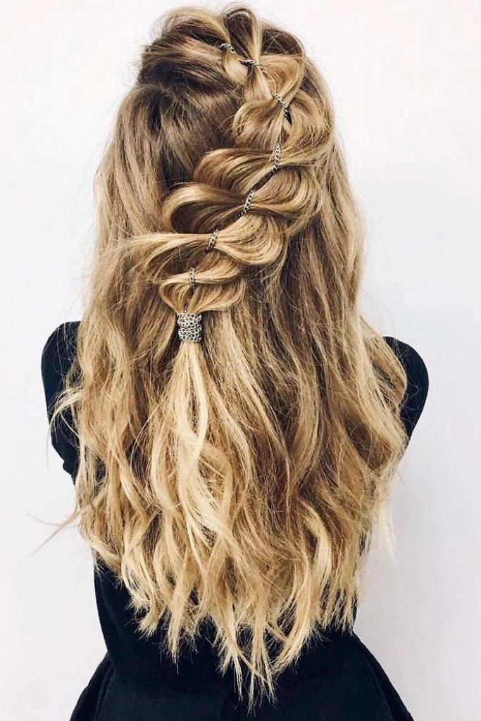 High school graduate with an elegant half-up hairstyle for graduation