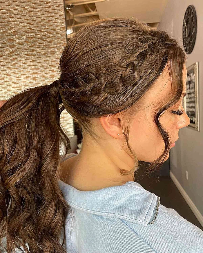 Effortless low ponytail graduation hairstyle for a clean and polished look Low maintenance graduation hairstyle featuring a sleek low ponytail with soft face-framing strands