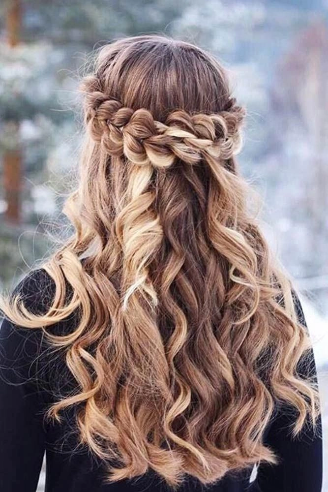 Wind-resistant graduation hairstyle with braided updo for outdoor ceremony Outdoor graduation hairstyle designed to withstand windy conditions, featuring a braided updo
