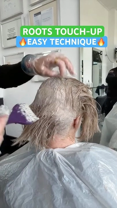 Graduation hairstyle with freshly touched up roots blending seamlessly into styled hair