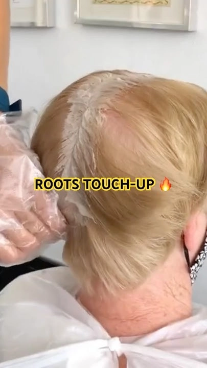 Graduation hairstyle featuring root touch up for seamless color blending