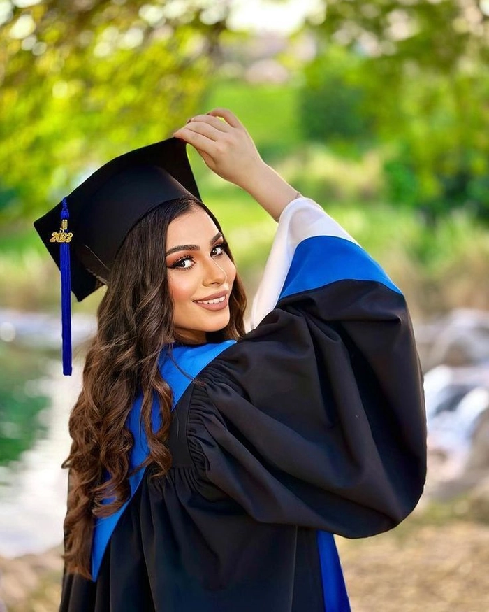 Sweat proof graduation updo hairstyle with secure pins and sleek finish