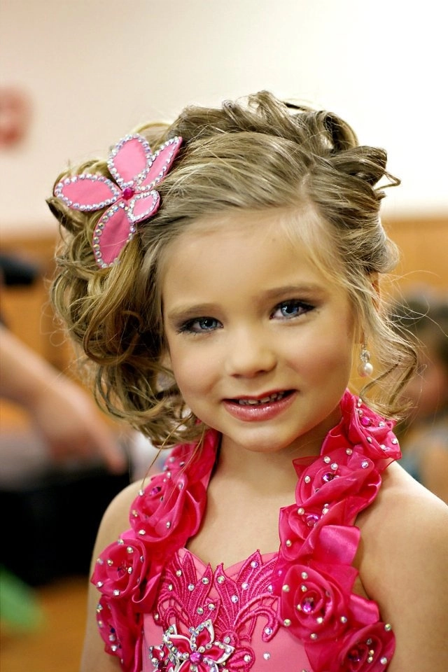 Comfortable updo for a child in a holiday pageant