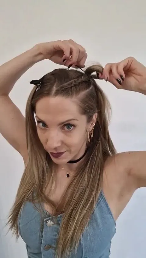Edgy space buns hairstyle perfect for alternative New Year's Eve events