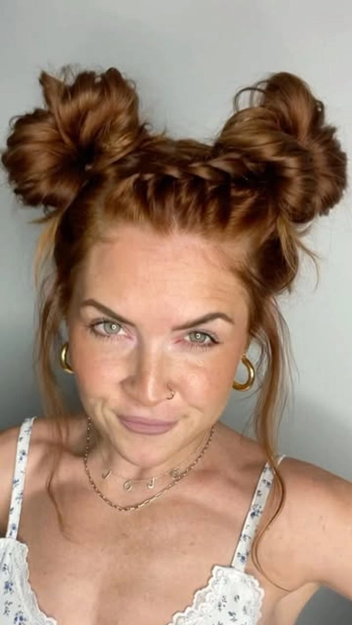 Edgy space buns hairstyle for alternative New Year's Eve celebrations
