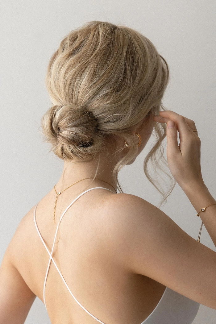 Effortless low bun hairstyle for a family holiday gathering