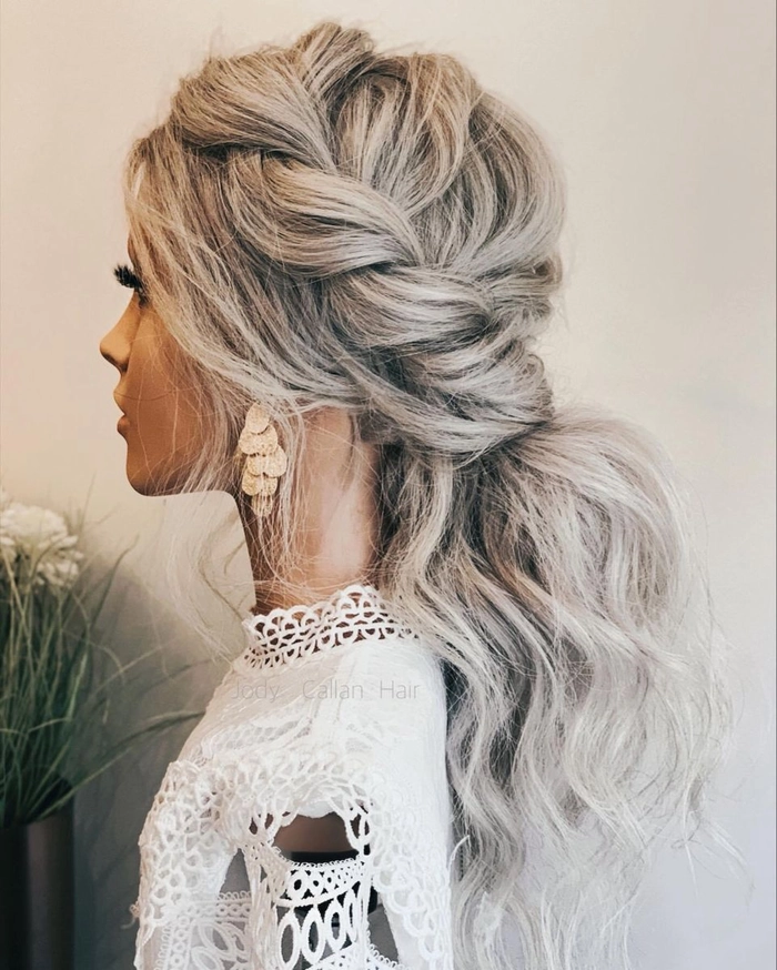 Elegant gray hair styled in an updo with sparkling accessories for a holiday formal event