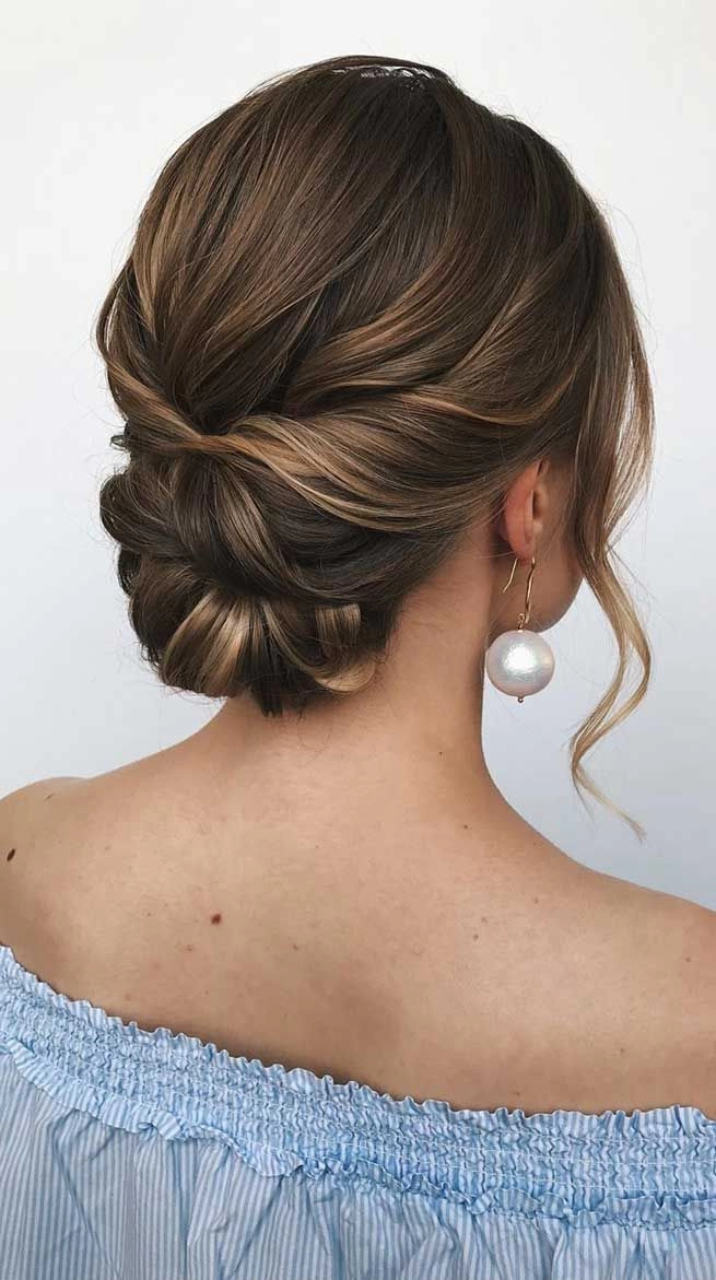 Elegant gray hair updo with glittering holiday accessories for a formal evening event
