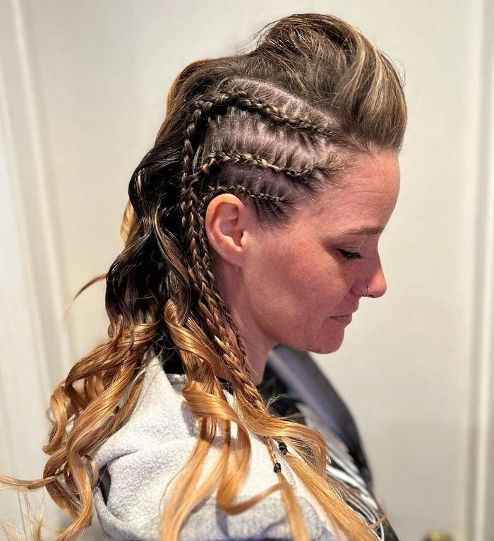Faux Hawk Braids for an Edgy Holiday Concert Look Edgy faux hawk braids hairstyle perfect for holiday concert crowds
