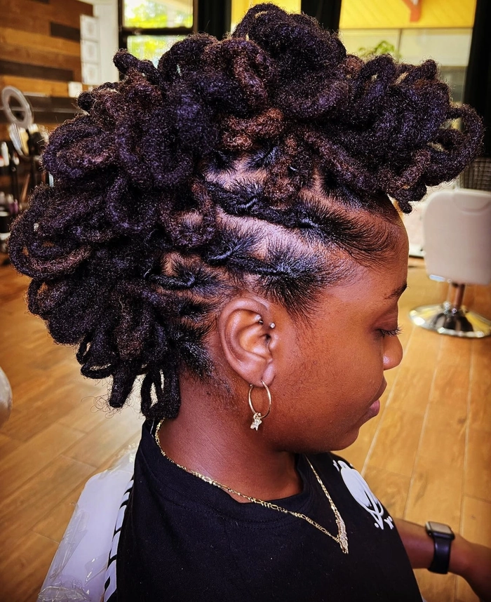 Edgy holiday concert faux hawk braids hairstyle Faux hawk braids styled for an edgy holiday concert look