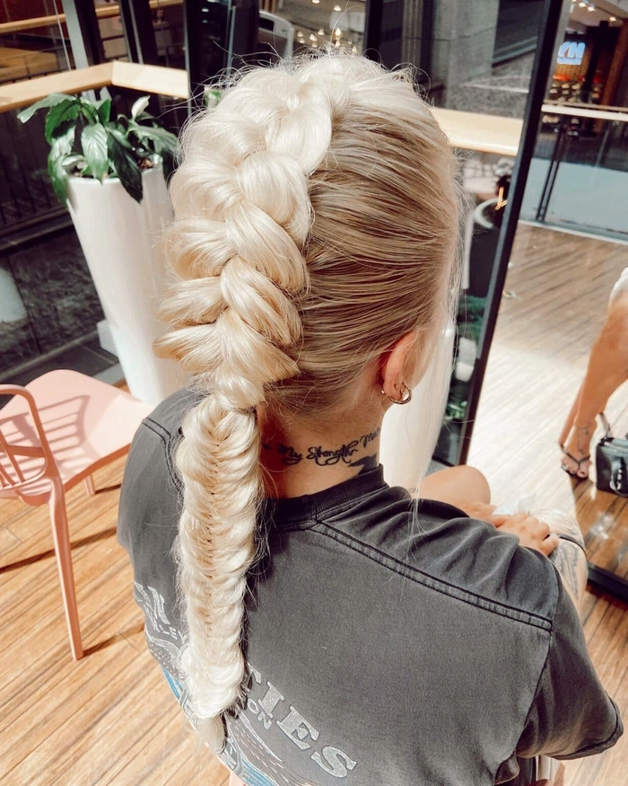 Faux Hawk Braids: Edgy Holiday Concert Hairstyle Edgy faux hawk braids with festive details for a holiday concert