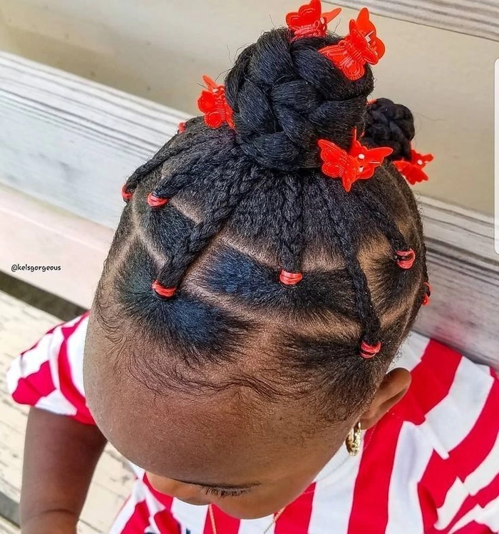 Festive braided pigtails for little girls with holiday sparkle and ribbon accents