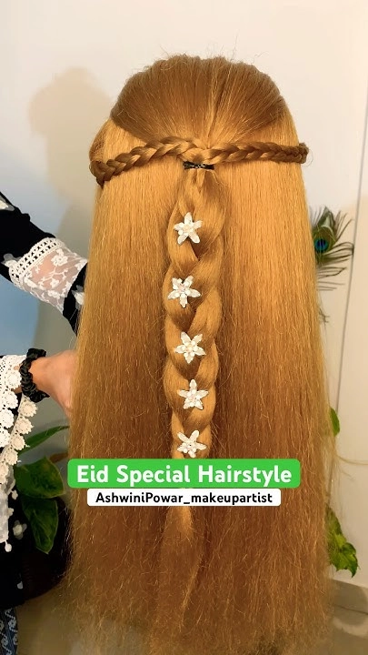 Eid hairstyle with sparkling festive hair accessories perfect for holiday gatherings Festive hair accessories like gold pins and velvet headbands styled for an Eid gathering celebration