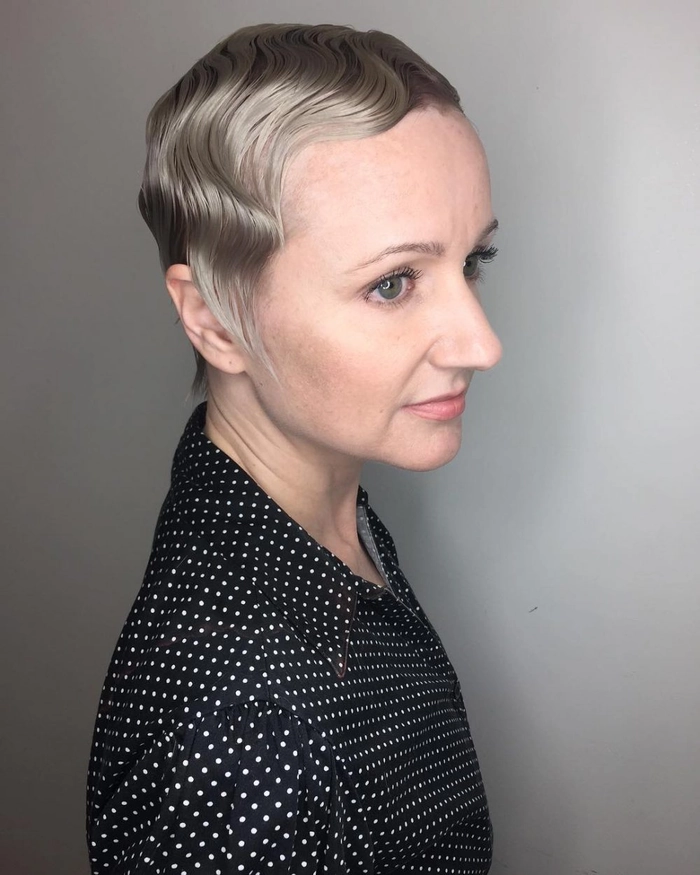 Finger wave hairstyle with glittering headpiece for a Roaring Twenties New Year's Eve party