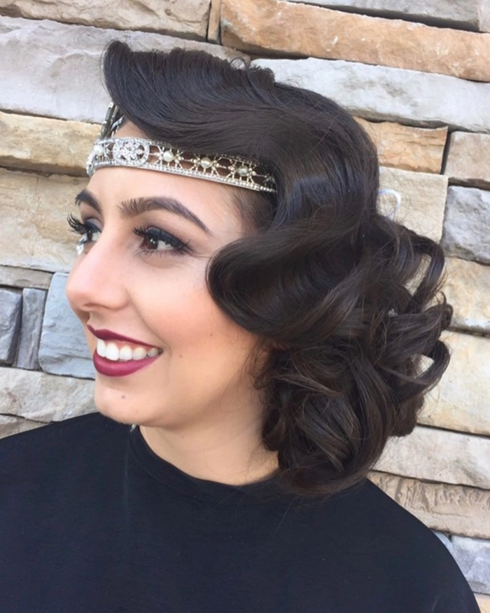 Finger wave hairstyle with sparkling hairpin for a Roaring Twenties New Year's Eve party look