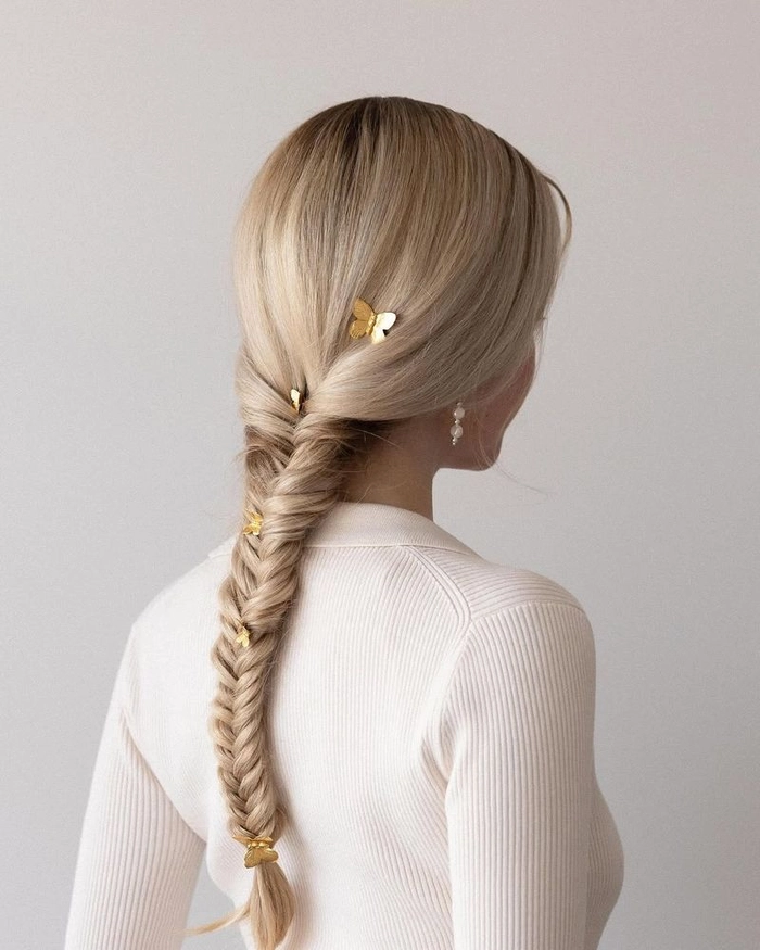 Easy fishtail braid for holiday travel Casual fishtail braid hairstyle for a beach vacation