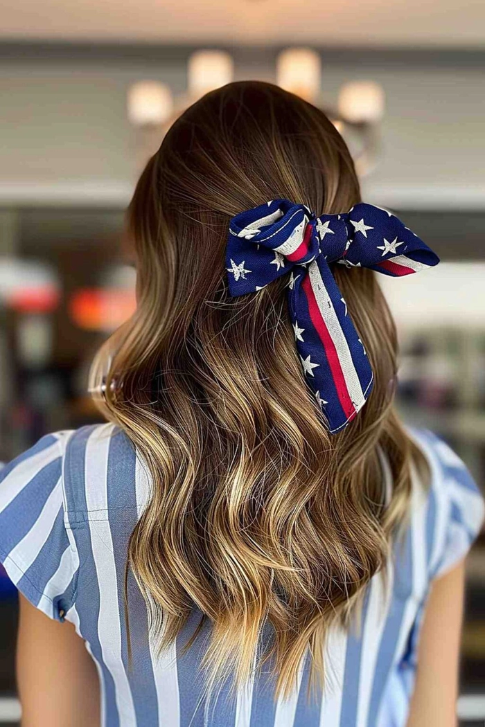 Patriotic hair ribbon styling for Independence Day Beautiful red, white, and blue ribbons woven into a festive Fourth of July hairstyle