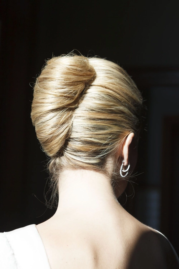 French Twist Variations for Formal Holiday Dinners - Holiday Hairstyles Image 3 Elegant French twist hairstyle with subtle volume and decorative pins, perfect for a formal holiday dinner