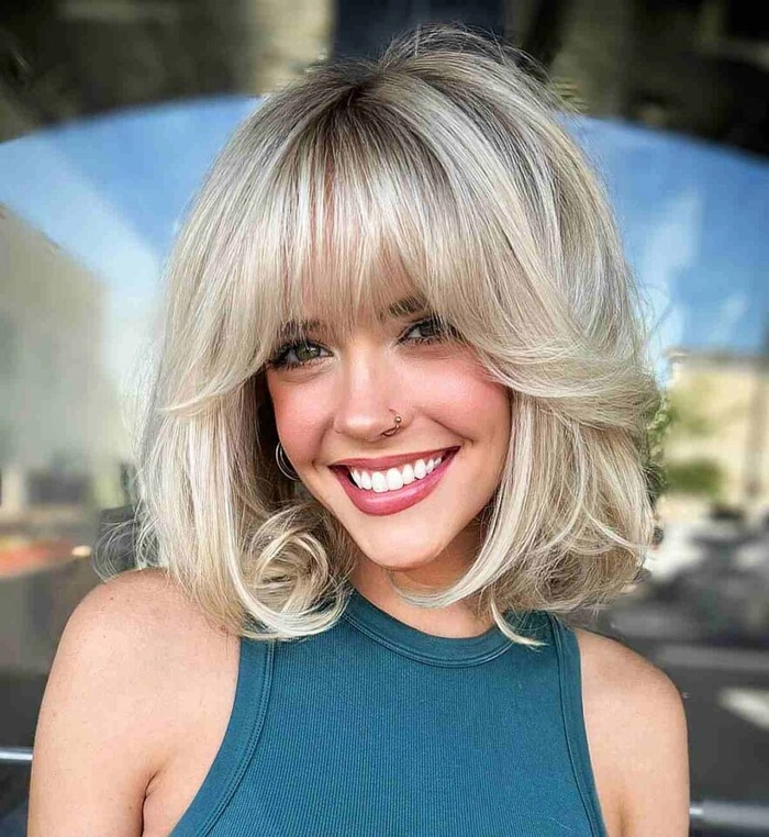 Textured lob with soft waves styled for a Friendsgiving party gathering