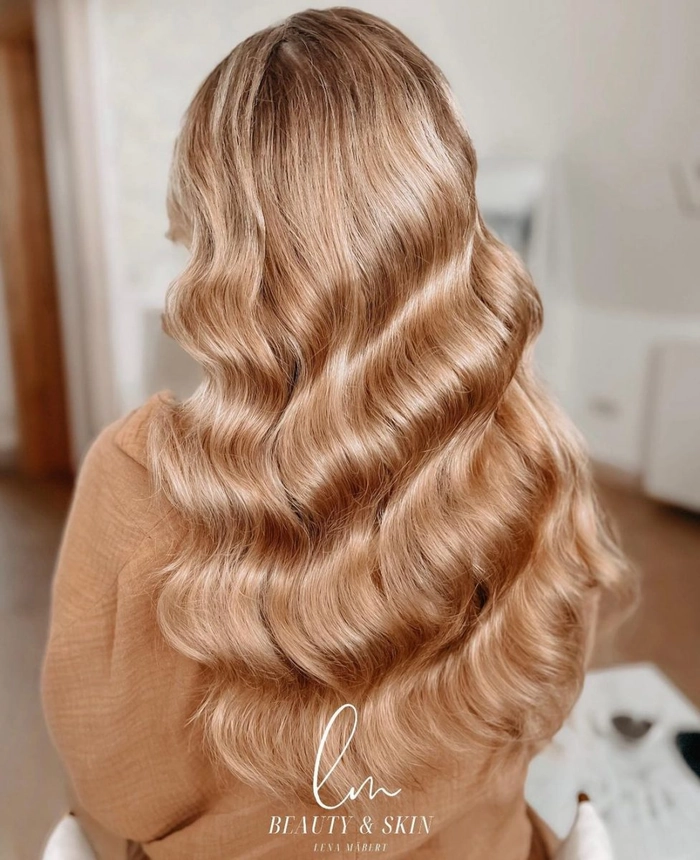 Glamorous Hollywood waves hairstyle perfect for New Year's Eve celebration