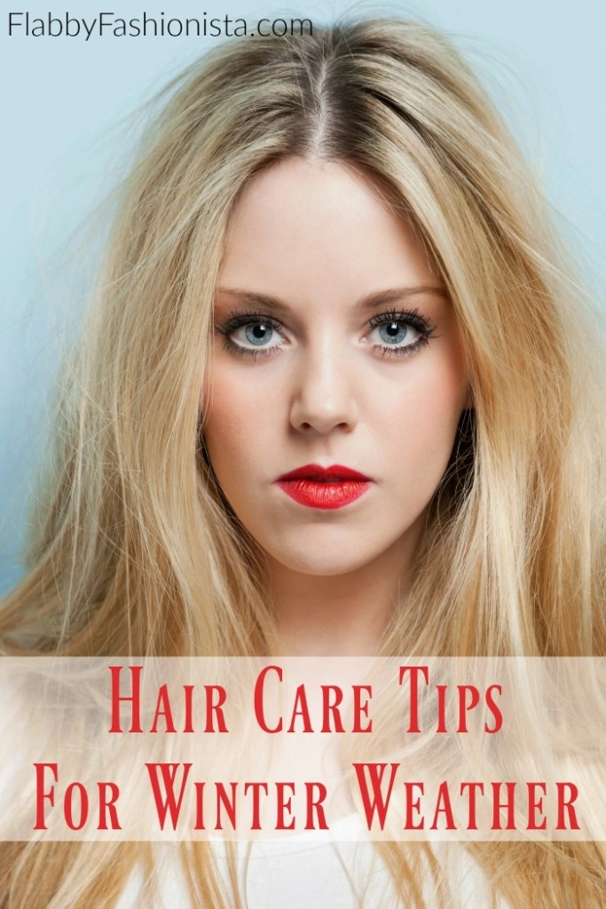 Essential holiday hair maintenance tip for cold weather protection Woman applying leave-in conditioner to protect holiday hairstyle from winter weather