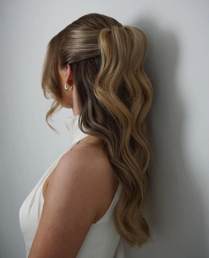 Elegant half up hairstyle for a holiday theater outing