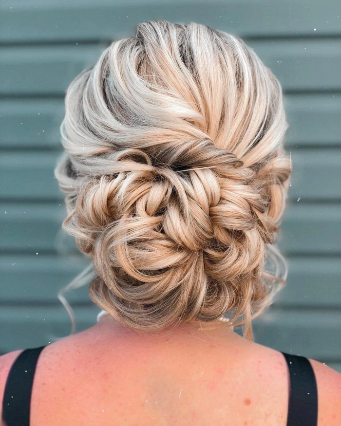 Holiday Wedding Guest Hair Inspiration - Elegant Updo with Sparkle Holiday wedding guest hairstyle with elegant waves and a shimmering accessory