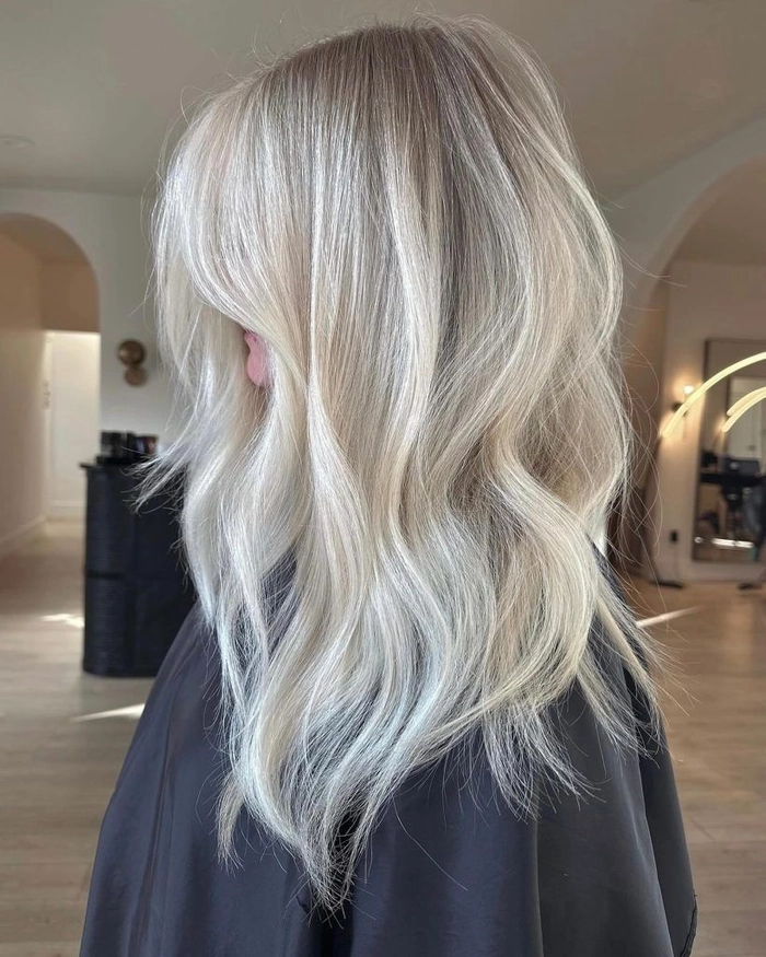 Icy blonde toned hair for a winter bride's holiday wedding hairstyle