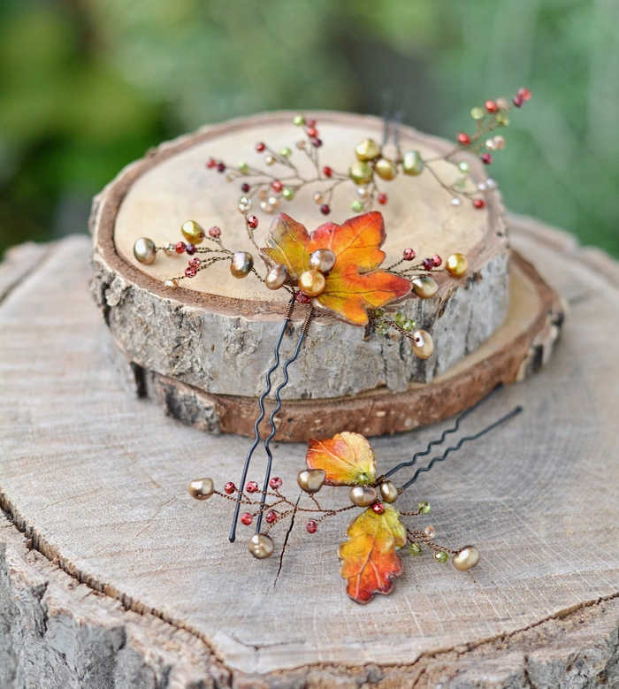 Autumn leaf hair pin adds seasonal flair to an elegant updo hairstyle
