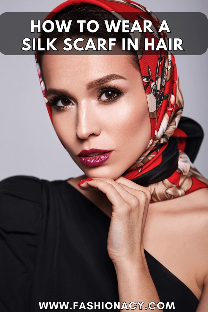 Woman styling a silk scarf wrapped around her head for winter hair protection as a holiday hairstyle