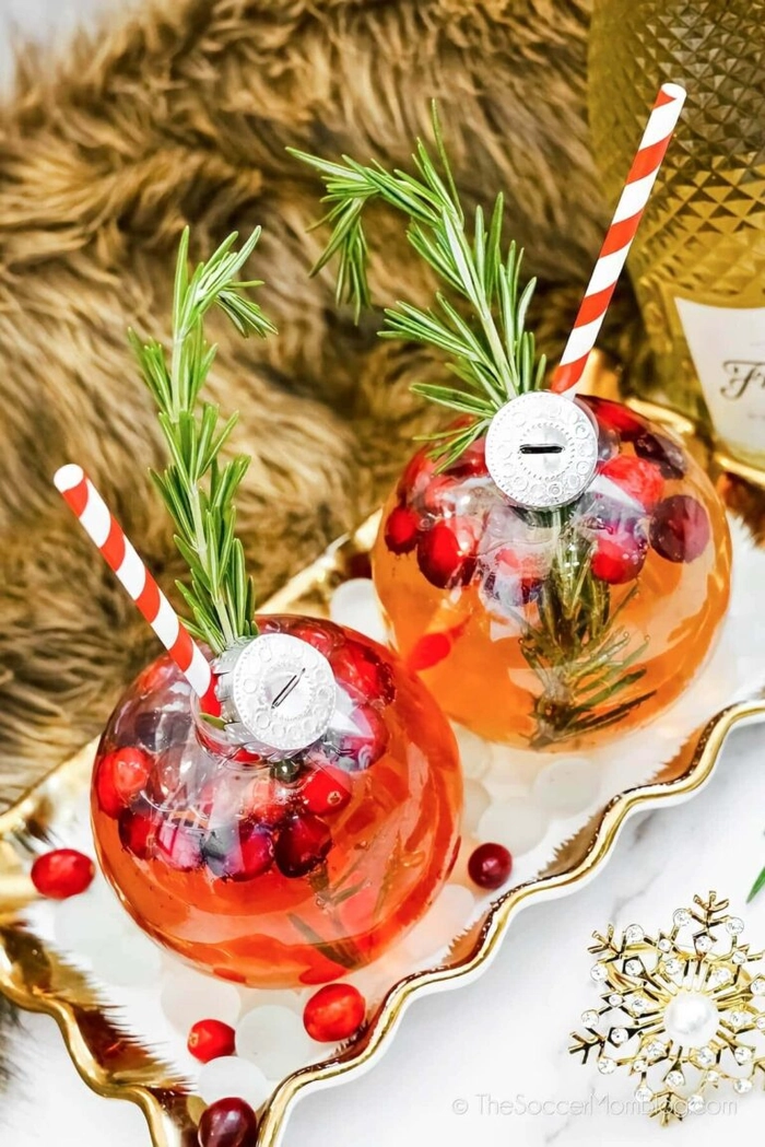 A woman with a voluminous blowout hairstyle posing at a festive cocktail party with holiday decorations