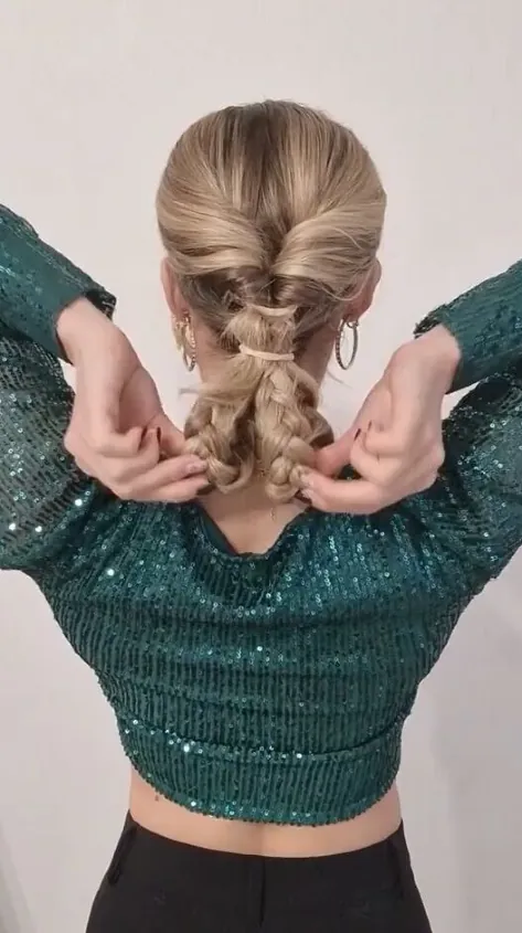 Thick hair holiday updo that holds all night, elegant twisted bun for festive occasions