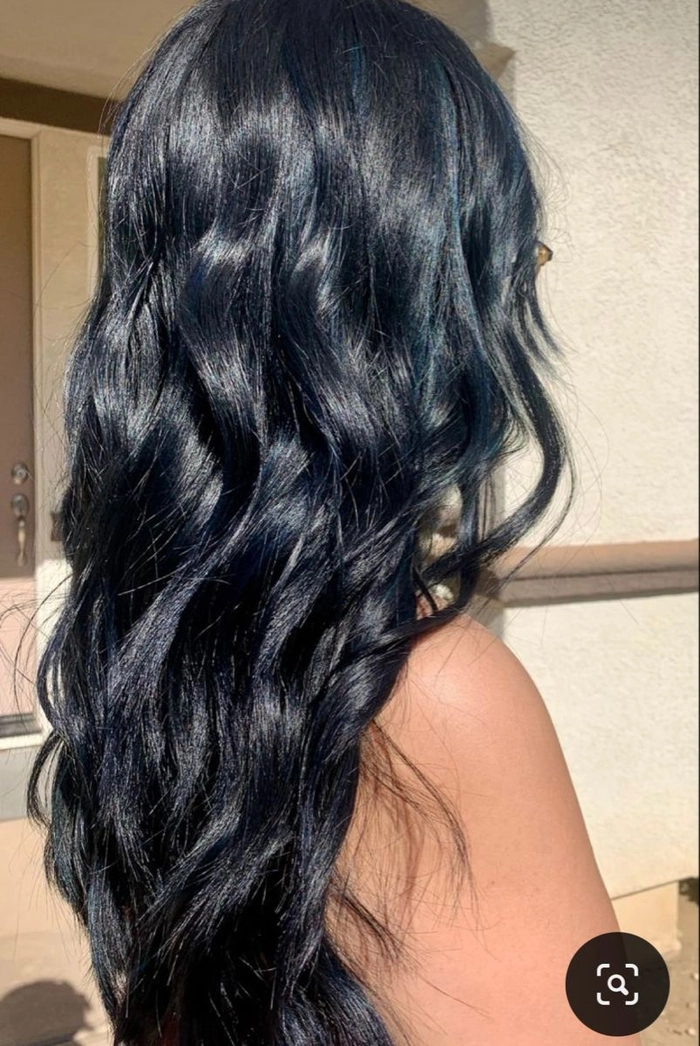 Quick midnight countdown hair touch up with a sparkly clip and smoothing spray